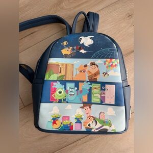 Loungefly Disney Pixar Toy Story Mini Backpack Blue Character Panels